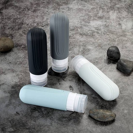 EverNeeds Bouteilles de voyage avec étui - rechargeables - Bouteilles de voyage en silicone pour bagages à main - gris - 4 pièces