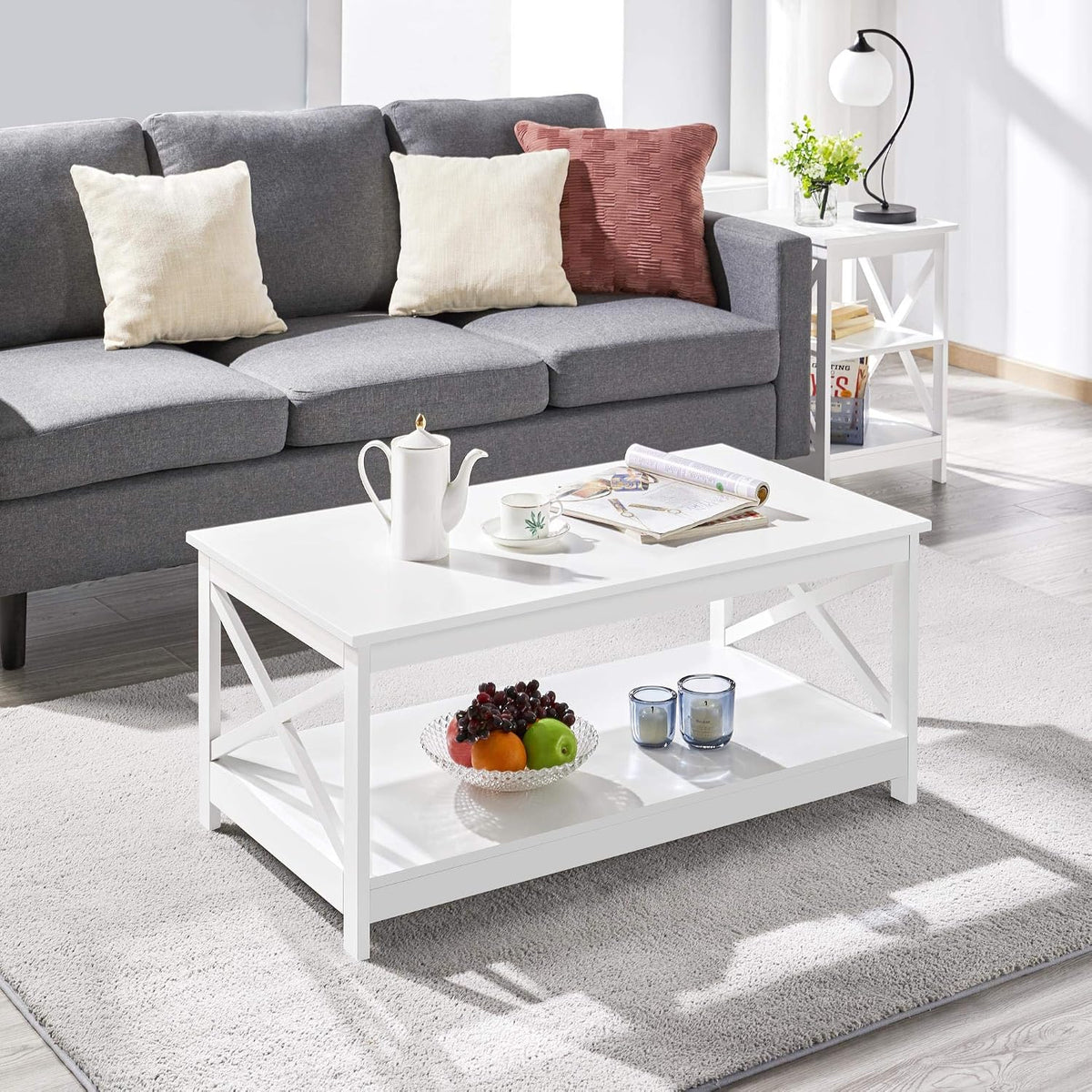 Table basse avec 2 étagères et structure en X, 100 × 50 × 45 cm, blanche