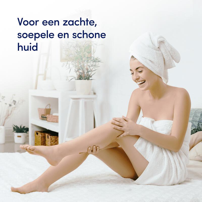 Crème de bain Dove Caring Bath Indulging Cream - 450 ml - Mousse de bain hydratante contenant ¼ de crème nourrissante - Pour une peau douce et souple