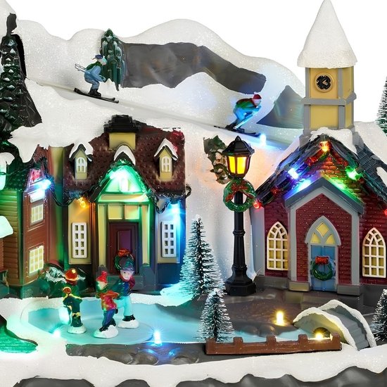 Luville Village de Noël miniature - Place du village - Décoration de Noël avec des habitants qui patinent - Décoration de Noël avec éclairage LED et figurines tournantes - L 34 x l 18 x H 24 cm - Blanc
