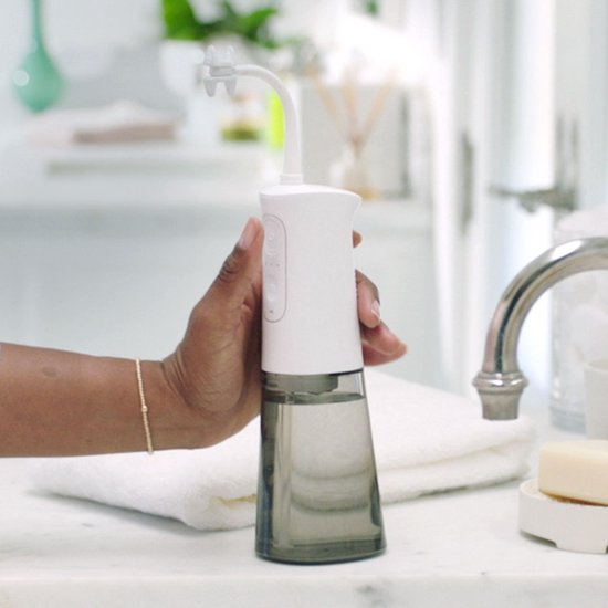 Douche dentaire électrique CorpCare MiracleSmile – Rechargeable, pression d'eau réglable, embout en forme de H, compacte et étanche, idéale pour les gencives sensibles