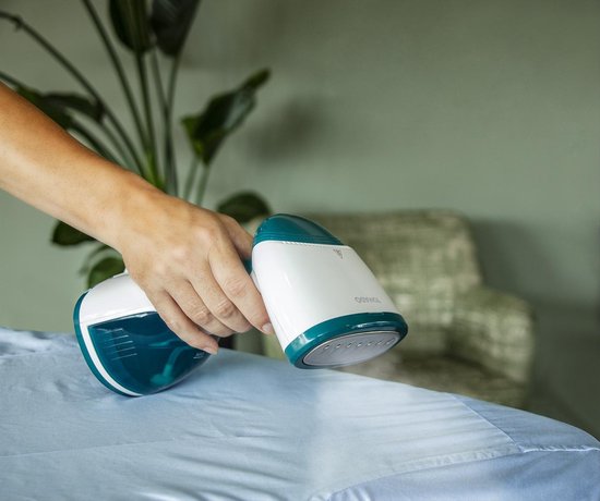 Tomado TSH1201W - Défroisseur linge - Défroisseur mains - Démêleur - Nettoyeur vapeur - 2 brosses incluses - Blanc/turquoise