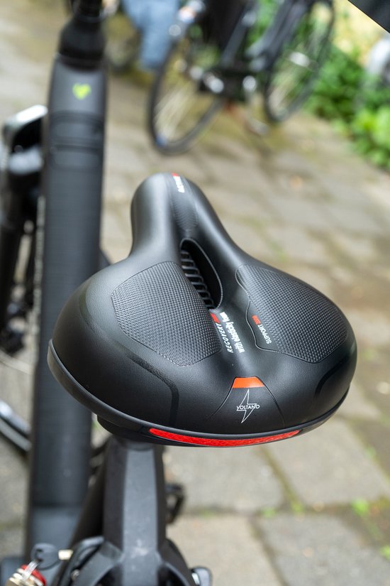 Selle de vélo Voltano avec coussinets en gel - Noir/Rouge - Découpe - Suspension - Unisexe - Sangle de selle incluse
