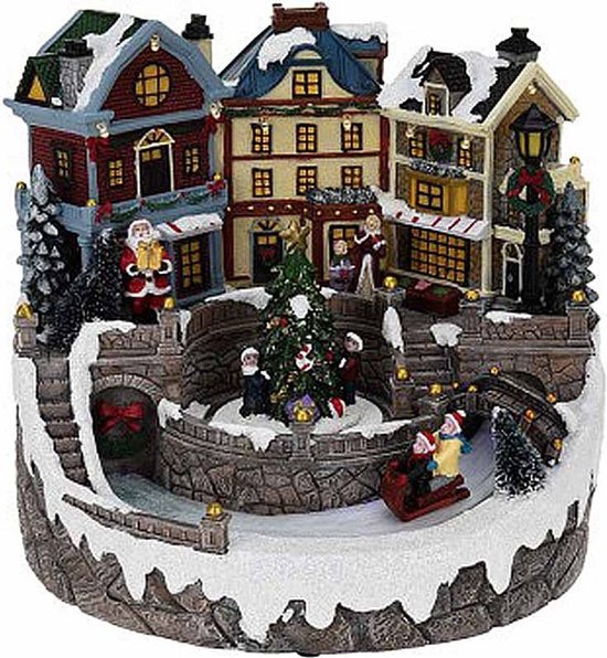 Village de Noël avec lumières et mouvement