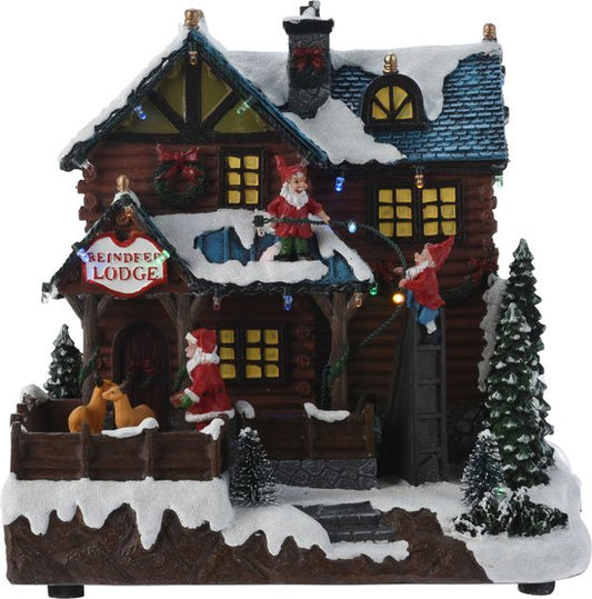 Maison du village de Noël - avec mouvement, lumières LED et musique - 25 cm - poliresin