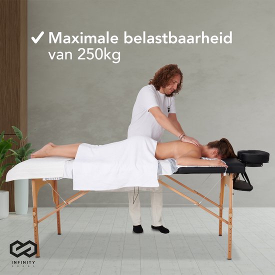 Table de massage Infinity Goods - pliante - capacité 250KG - 8 supports de hauteur - sac de rangement inclus - table de traitement - noire