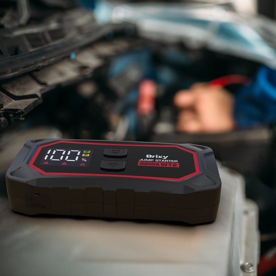 Brixy Jumpstarter pour voiture - 2200A / 16,000 mAH - Aide au démarrage 4-en-1 - Lampe de poche LED, Lumière d'urgence SOS et Powerbank - Rouge/Noir