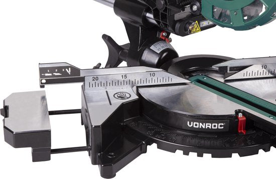 Tronçonneuse et scie à onglets VONROC avec fonction de traction - 2000W - Ø216MM - Eclairage LED sur la pièce - Laser pour une ligne de coupe parfaite - Largeur de coupe supplémentaire 340mm - Rallonges de table réglables avec butée de longueur - Lame de