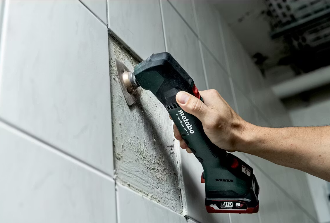 Metabo - Accu-Multitool Body - 12 V & OMT-System - Avec éclairage LED et poignée fine - Pour scier, poncer et gratter - Métal vert et noir