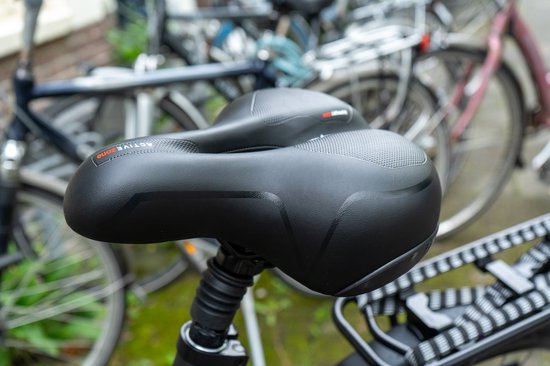Selle de vélo Voltano avec coussinets en gel - Noir/Rouge - Découpe - Suspension - Unisexe - Sangle de selle incluse