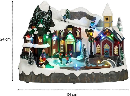 Luville Village de Noël miniature - Place du village - Décoration de Noël avec des habitants qui patinent - Décoration de Noël avec éclairage LED et figurines tournantes - L 34 x l 18 x H 24 cm - Blanc