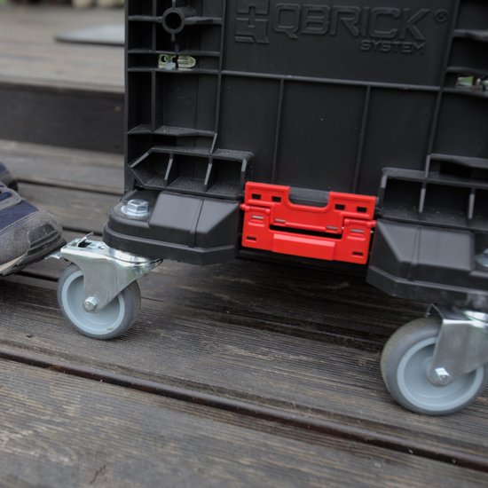 Qbrick System - PRO Transport Platform - 506 x 325 x 140 mm - Plastique noir - Base mobile avec 4 roulettes pivotantes et 2 freins - Poids maximum de 100 kg