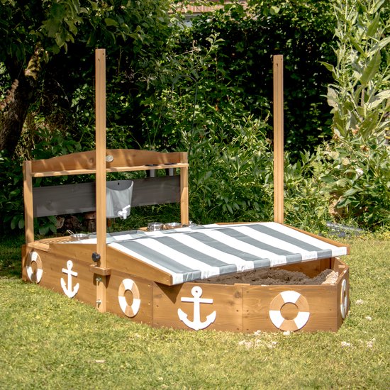 Bac à sable AXI Dora Boot avec cuisine ludique et toit (UV50) 160 x 100 cm Anthracite/marron – Avec tableau noir et espace de rangement - Toile de protection incluse - Garantie 10 ans !