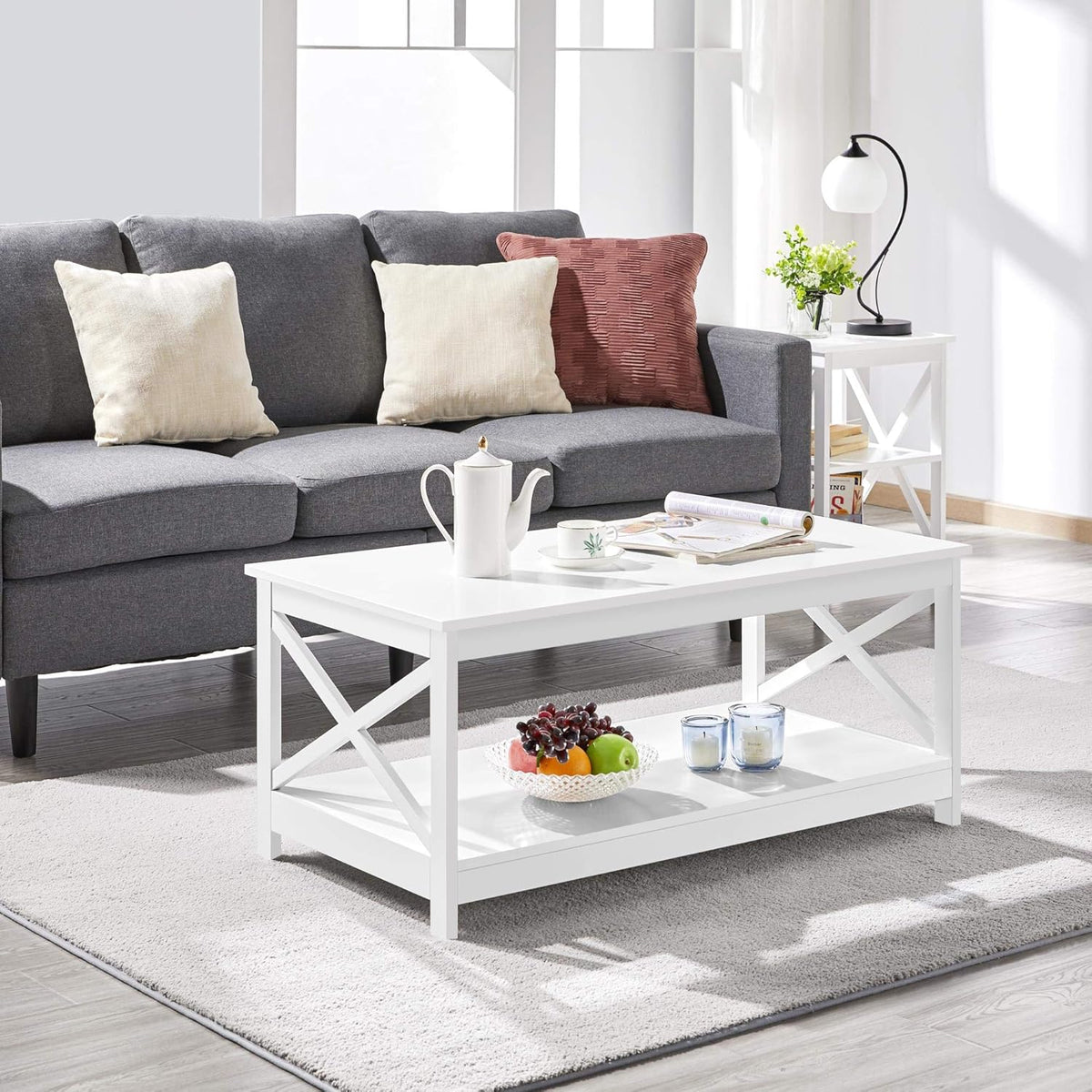 Table basse avec 2 étagères et structure en X, 100 × 50 × 45 cm, blanche